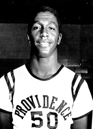 John Thompson graduates from 
Providence College in 1964.